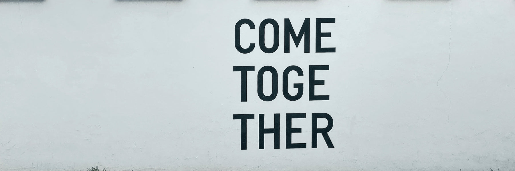 A sign that says 'come together'